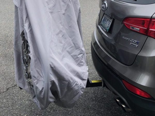 Custom cover for a hitch rack