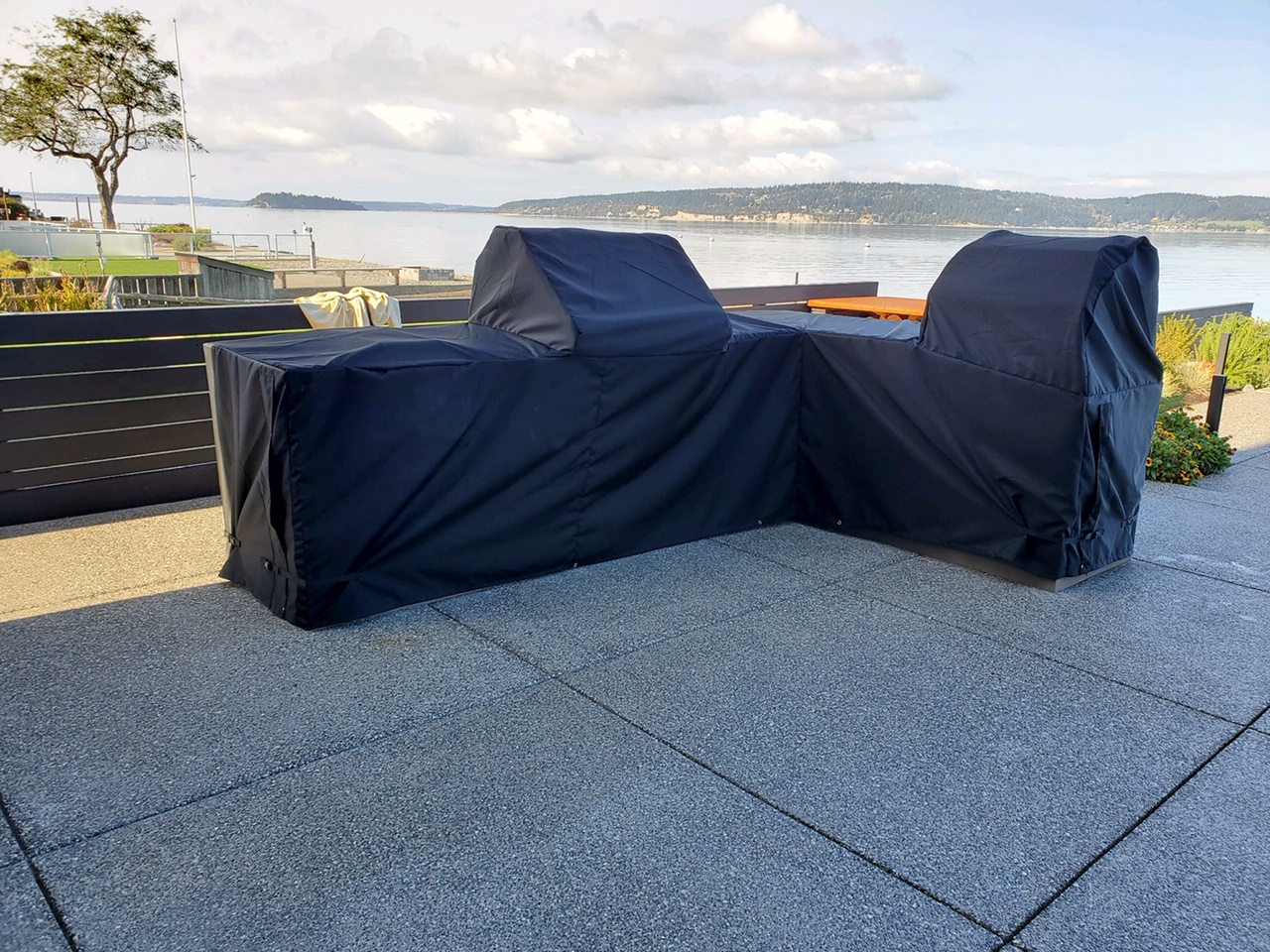 L-shaped island with grill on outdoor patio