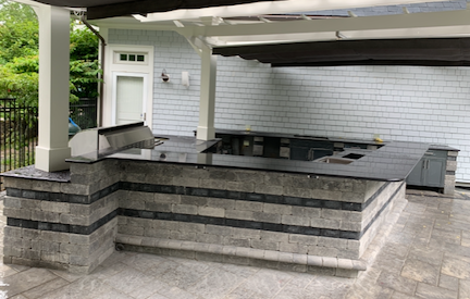 U-shaped outdoor island with built in grill